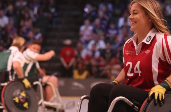 woman playing wheelchair sport